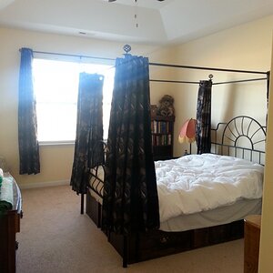 Master bedroom - it was important to keep the bed with curtains because of my weird schedule.